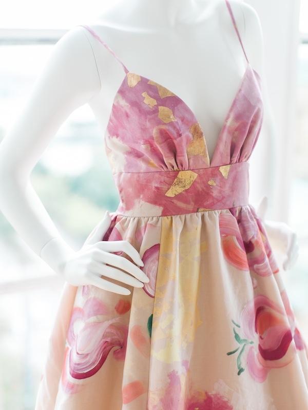 As market proved, color is the new white, and this bridal gown by Katherine Mullins McDonald shares that sentiment in soft hues of pink, gold, and citrus, along with another trend: pattern. The designer (known for her LulaKate brand) debuted her new spinoff line of bridal frocks, Kate McDonald, at the party.