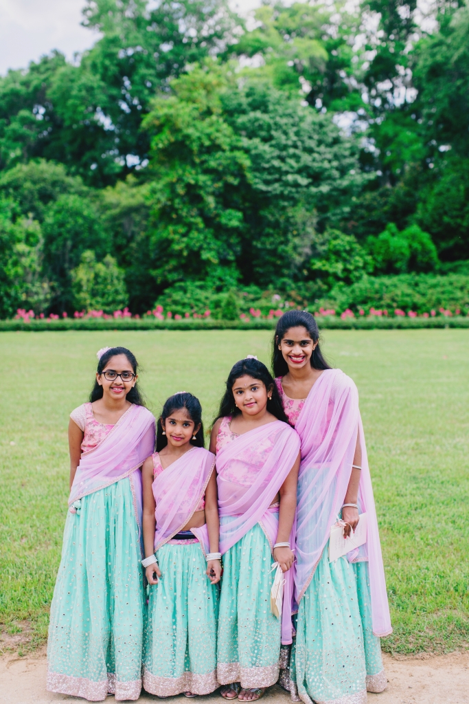 Manasa’s junior bridesmaids wore pink and seafoam green lehengas designed by the bride and her mother. &lt;i&gt;Photograph by Hyer Images&lt;/i&gt;