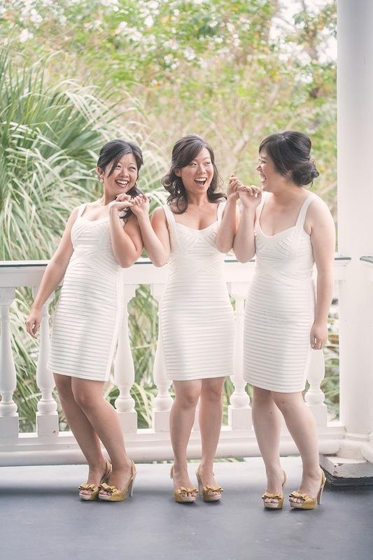 Bridesmaids went for a fresh, modern look with snowy BCBGMAXAZRIA shorties and gold “Sky Glitter” sling-backs from shoemaker Melissa. Image by Virgil Bunao Photography at Lowndes Grove Plantation.