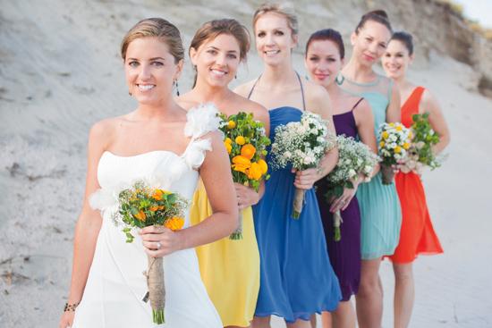 SISTERLY SUPPORT: Sara’s ’maids—including her twin sister (in yellow) were a huge help with wedding preparation. Together, they created their own bouquets and did the rest of the wedding florals as well.