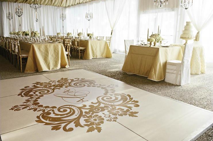 INITIAL REACTIONS: A sweetheart table for the bride and groom cozied up next to the monogrammed dance floor.