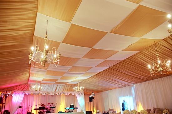 JAM BAND: Weaved gold and white fabric gave the ceiling of the dancing tent a rich yet spacious effect, while six-armed chandeliers and spotlights lit the large space.