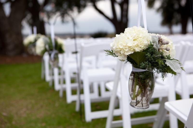 Florals by Tiger Lily Weddings. Rentals by Snyder Events and EventWorks. Image by Reese Moore Weddings at Lowndes Grove Plantation.