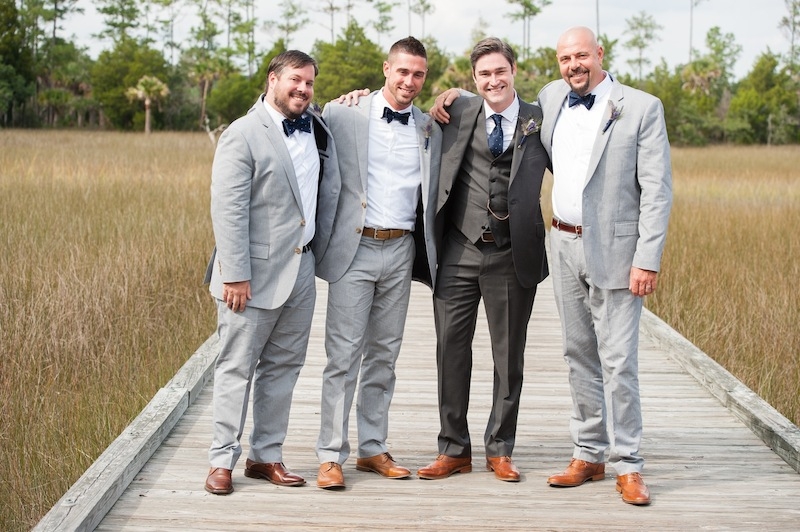 Groom’s attire by Rag &amp; Bone. Groomsmen attire by J.Crew. Image by Hunter McRae Photography at the Daniel Island Club.