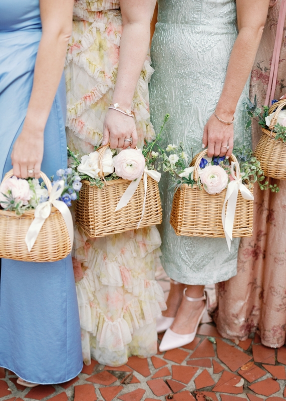 Cate’s “house party” girlfriends walked down the aisle holding a basket of flowers and sat in the front row.