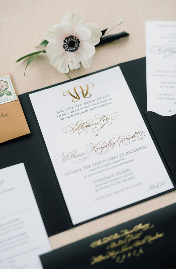Charleston stationer Dodeline Design crafted an elaborate trifold invitation suite with a custom monogram, a weekend program, and more.
