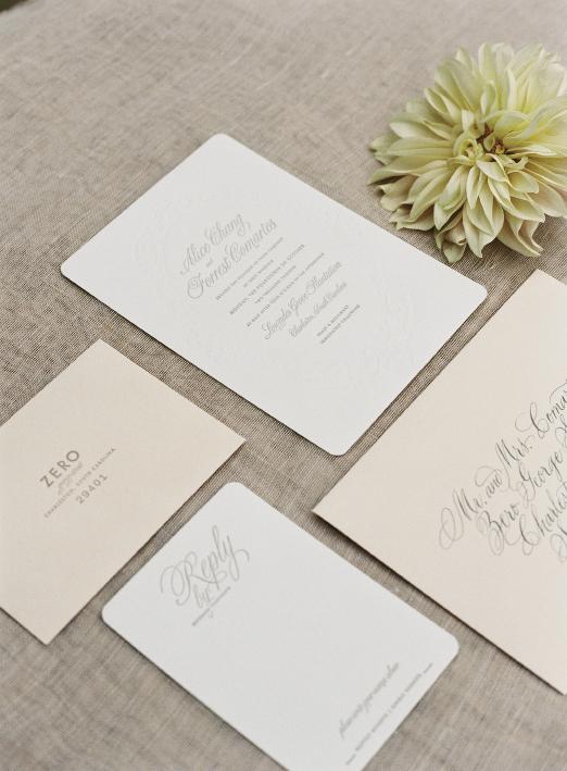 42 Pressed created a suite of classic stationery with swirling type and Elizabeth Porcher Jones calligraphed the envelopes.