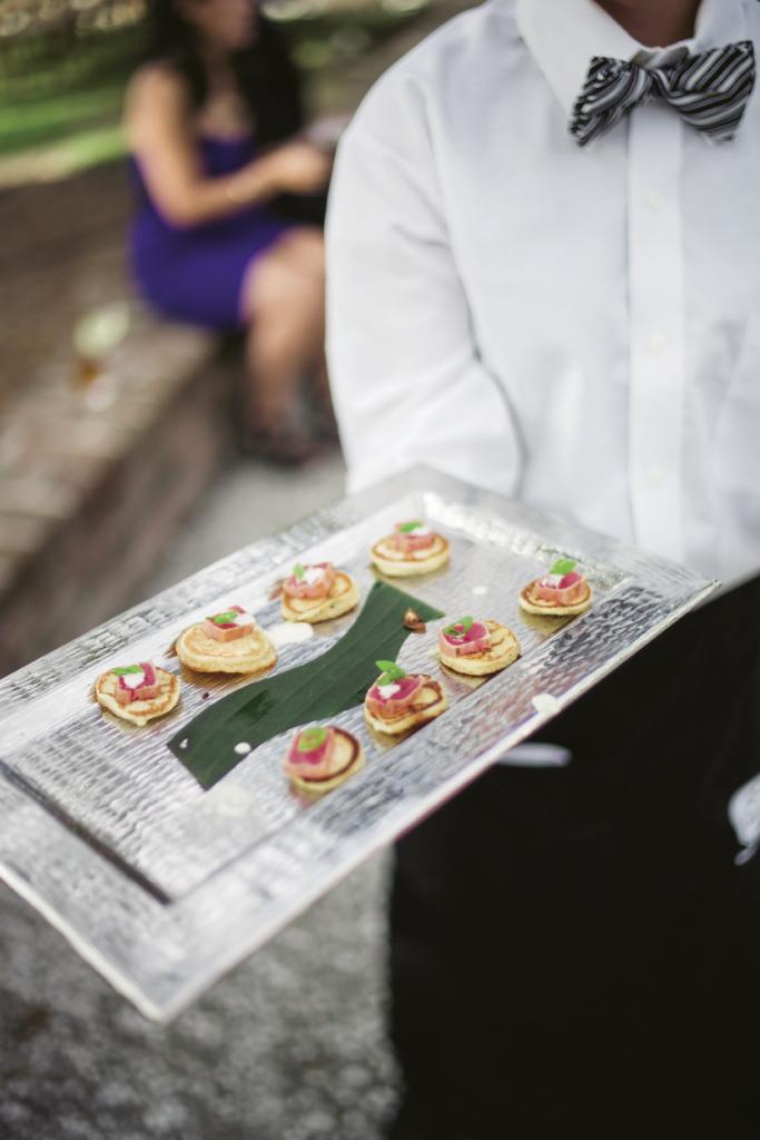 Fish Restaurant specializes in dishes with an Asian accent, so the couple’s wish for a Southern menu with Asian flair was a welcome request. Seared-tuna blinis were served during cocktail hour.