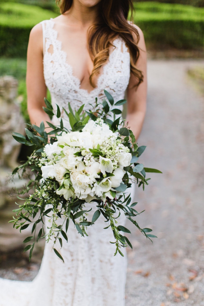 Bride’s gown by Inbal Dror. Bouquet by Out of the Garden. Hair by Swish. Image by Clay Austin Photography at Magnolia Plantation &amp; Gardens.