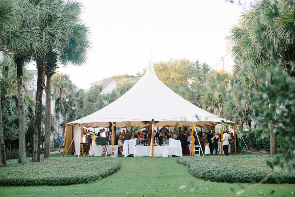 Wedding design by Sweetgrass Social. Tent by Sperry Tents Southeast. Image by Aaron and Jillian Photography at Wild Dunes Resort.