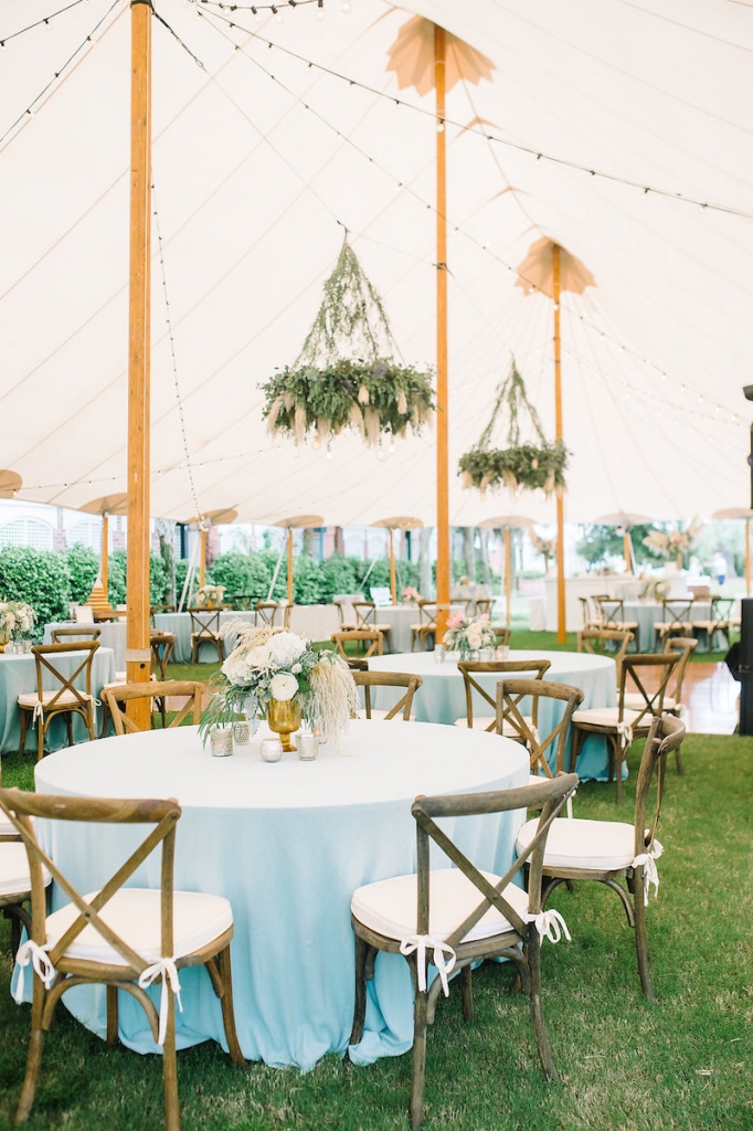 Wedding design by Sweetgrass Social. Florals by Branch Design Studio. Rentals from EventWorks. Tent from Sperry Tents Southeast. Linens from La Tavola. Image by Aaron and Jillian Photography at Wild Dunes Resort.