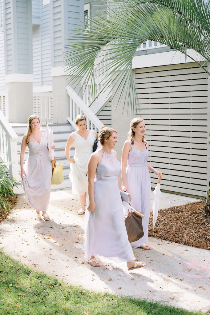 Bridesmaid gowns by Amsale from Bella Bridesmaids. Bride&#039;s gown by Maggie Sottero, available in Charleston through Bridals by Jodi. Image by Aaron and Jillian Photography at Wild Dunes Resort.