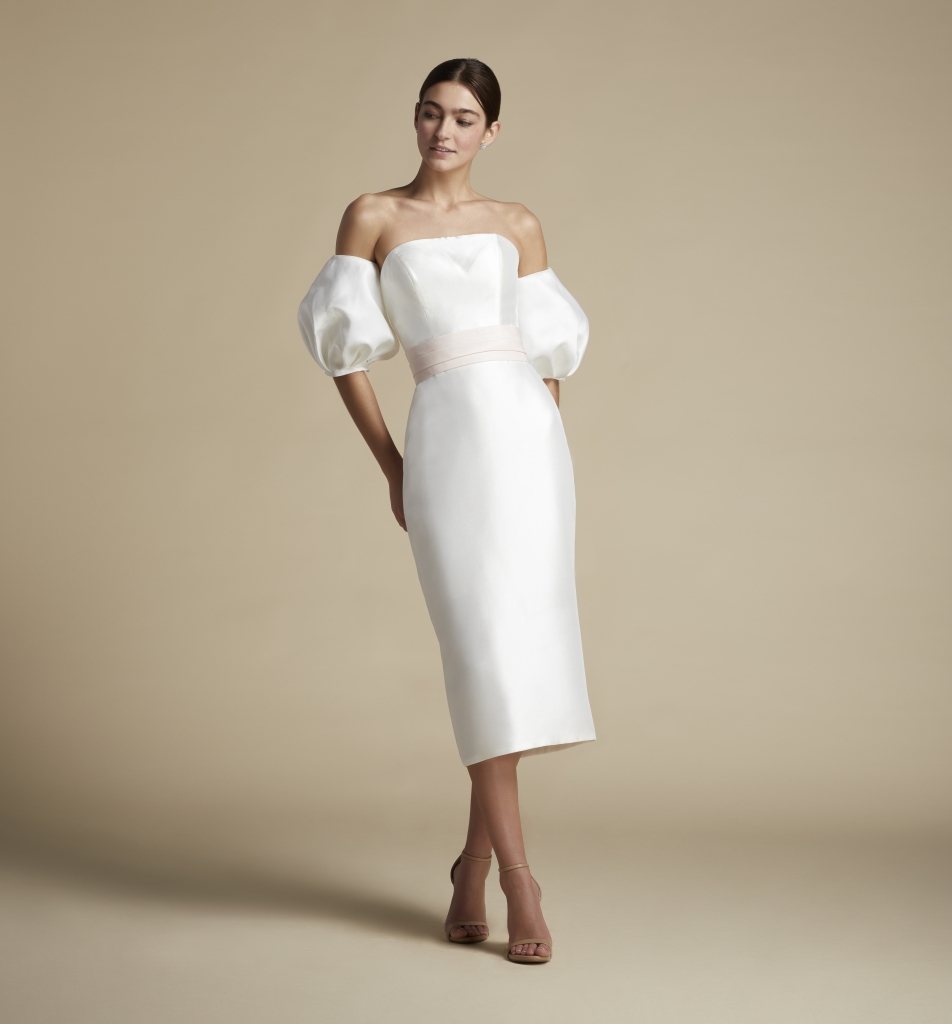 SHORT ORDER - “Baxter” Mikado midi dress, with detachable sleeves and silk taffeta bow, by Allison Webb Why We Love It “Tea-length dresses are in right now and so is the off-the-shoulder balloon sleeve look.”   –Jodi Moylan, White on Daniel Island