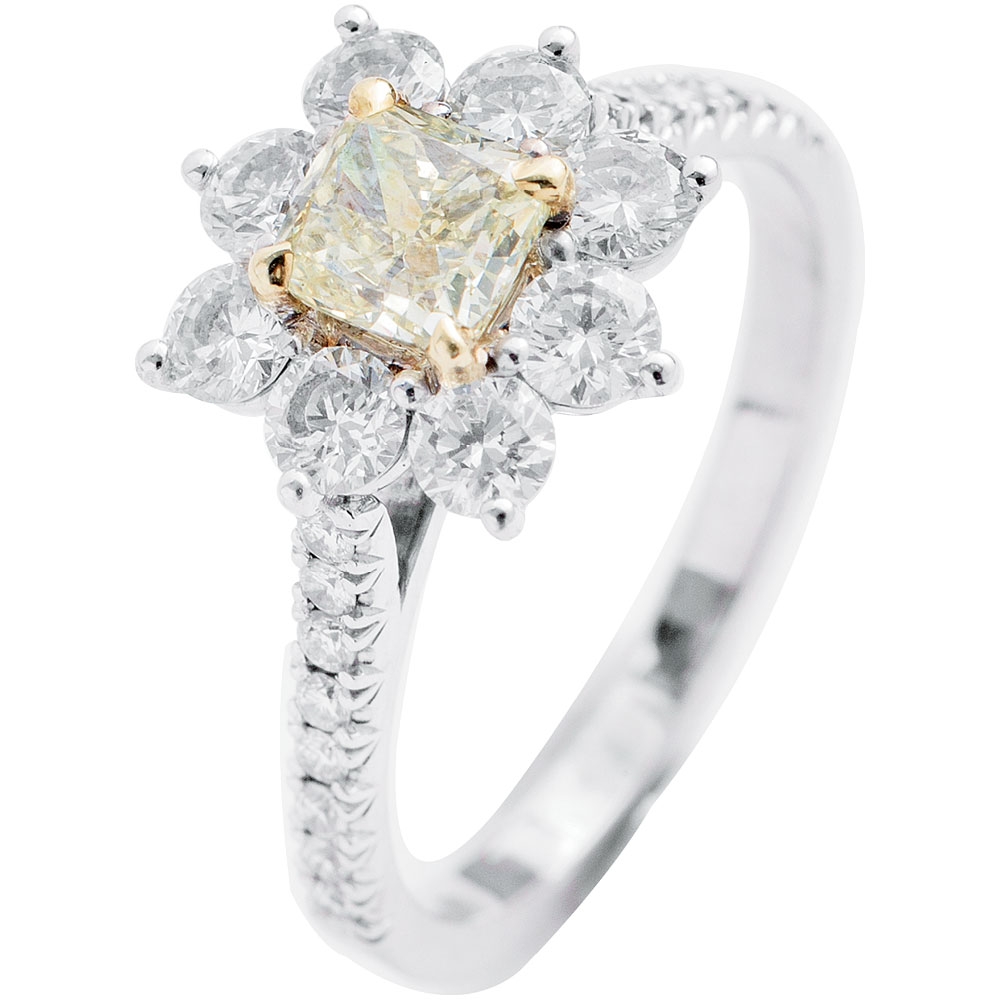 Forevermark’s 18K white gold ring with yellow diamond center (.70 cts.) and accent diamonds (1.72 total cts.) from Paulo Geiss Jewelers ($7,500)