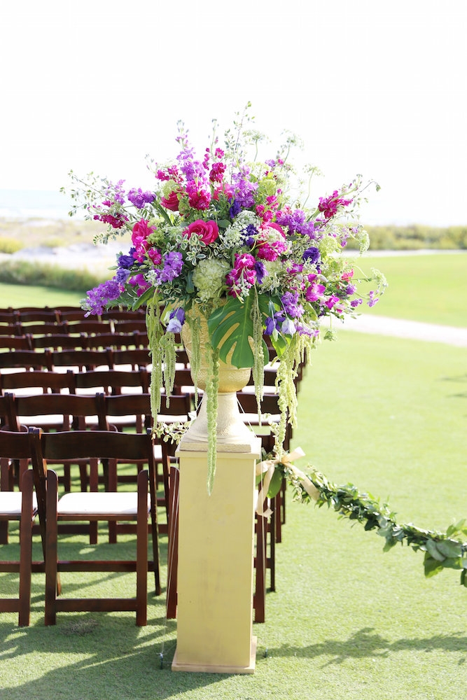 Wedding and floral design by A Charleston Bride. Chairs from EventWorks. Image by Lindsay Collette Photography.