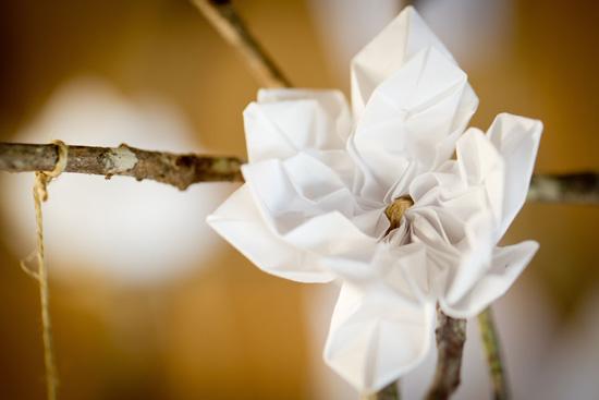 FLOWER POWER: Cindy tied origami flowers and cranes from recycled paper to branches, which were featured throughout the wedding and reception.