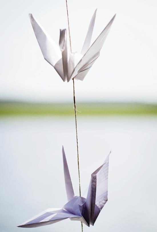 HANGING AROUND: Cindy made origami cranes—a symbol of longevity, loyalty, and happiness in Japanese culture—from recycled paper.