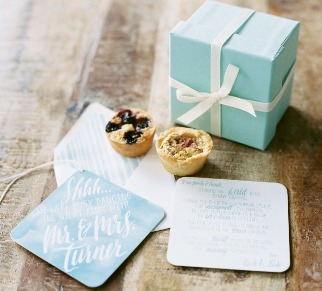 Simplicity in favors can be a lovely thing, like sweet tartlets from Sugar Bakeshop paired with a custom “Shhh” door note by Rebecca Rose Creative. Image by Perry Vaile Photography.