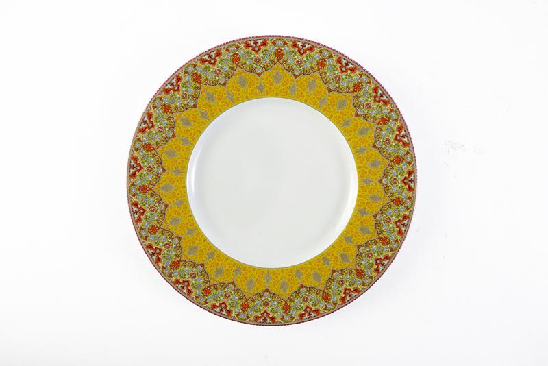Dhara Red Dessert Plate. The intense red and gold hues, inspired by India, along with the perfect gold matte finish, delivers vibrant life to your setting. Jeffrey Bannon, $85 (9.5-inch plate)