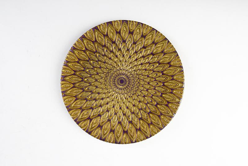 Vietri Peacock Glass Salad Plate. Italian designed, this glass plate mesmerizes with its vivid purple and gold color scheme. Gwynn’s of Mount Pleasant, $35 (8.5-inch plate)