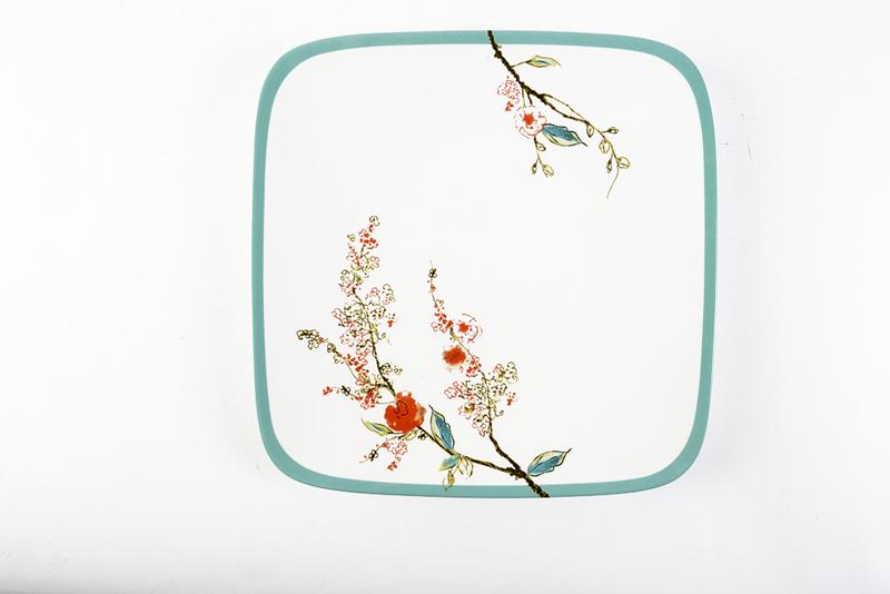 Lenox’s “Chirp” Square Dinner Plate. Bone-china sporting Asian influences like delicate blooming branches and birds in bold teal and reds, this squared plate pairs well with round samples. Belk, $42 (10.25-inch plate)