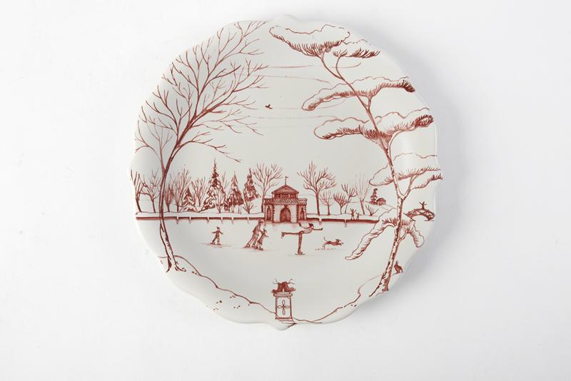 Juliska’s “Country Estate” Dessert Plate in Ruby. The scalloped edges and snowy boathouse scene on this plate make it the perfect go-to for festive décor. GDC Home, $98 (8.5-inch plate)