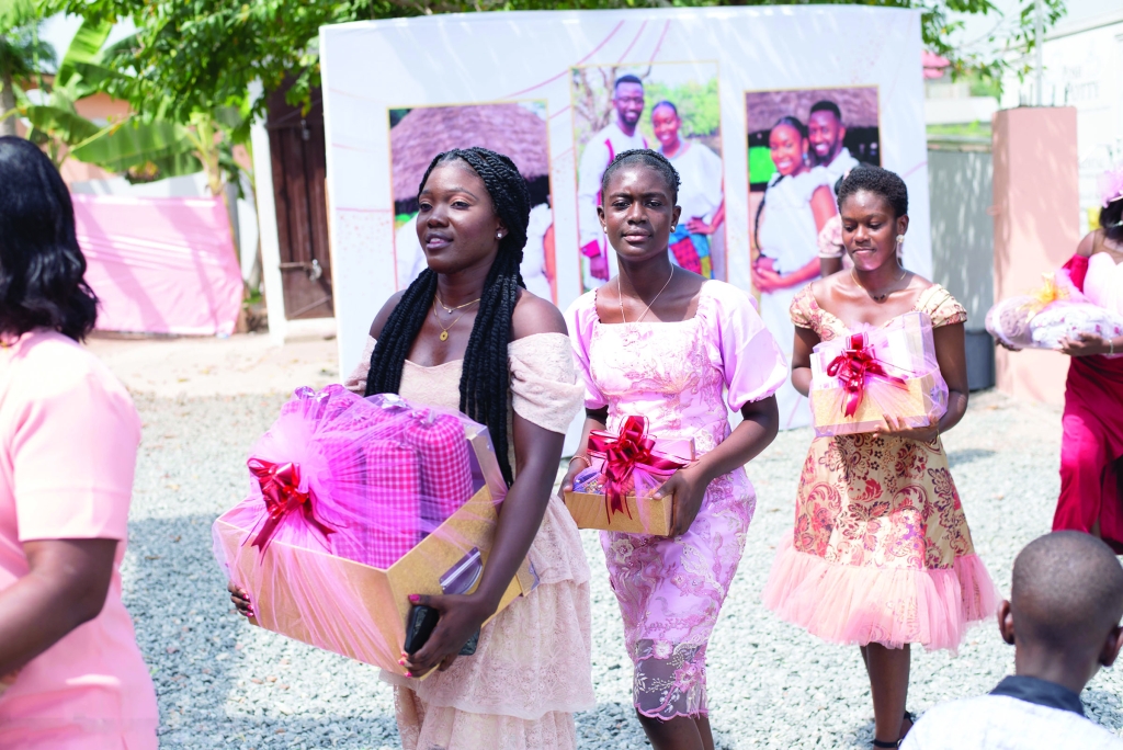 In keeping with the country’s custom, Ebenezer’s sisters organized and wrapped gifts to present to the bride and her family.