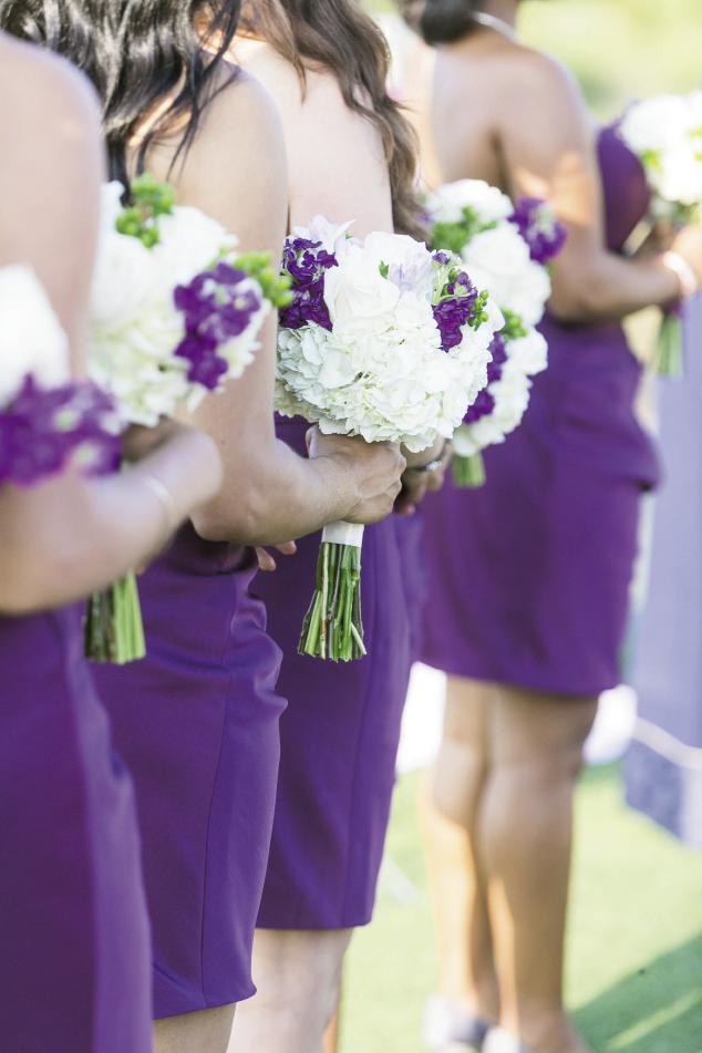 PALETTE PLAY: Bridesmaids carried white bouquets of hydrangeas and roses with sprigs of purple stock.