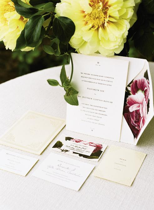 DOWN THE GARDEN PATH: Save-the-date cards from Sideshow Press featured pressed flowers, so the stationery suite included a floral theme, too.