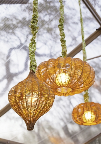 HANGING AROUND: Woven lanterns with custom cord covers added an organic element.