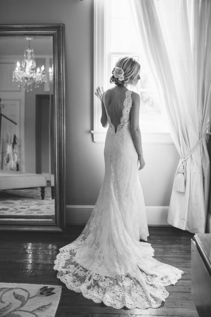 Bride&#039;s gown by Marisa Bridals. Hair by Paper Dolls. Photograph by Juliet Elizabeth at the Legare Waring House.