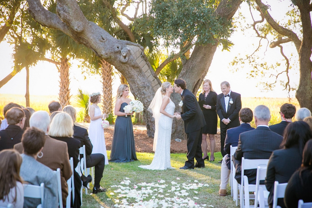 Bride&#039;s gown from Gown Boutique of Charleston. Photograph by Dana Cubbage Weddings at Lowndes Grove Plantation.