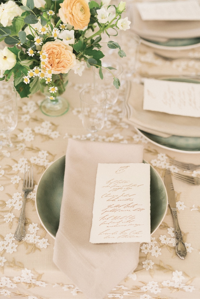 Prairie &amp; Sage designed the wedding suite. For a unique textural element, they incorporated bark paper, while botanical stamps added a natural touch.