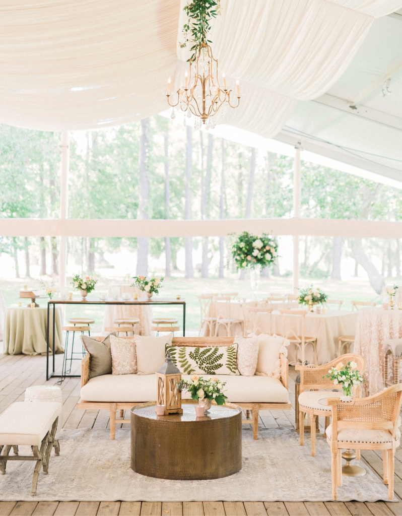 The bride envisioned a semi-rustic wedding with natural accents, greenery and bright florals, romantic lighting, and a touch of glamour. Working with a neutral color palette, planner Haley Kelly leaned heavily on texture, mixing linens and other fabrics to create a look that’s refined yet relaxed.