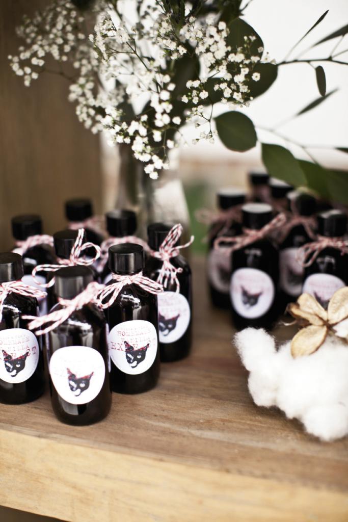 PET PROJECT: The pair made homemade vanilla extract favors and picked cotton for décor.