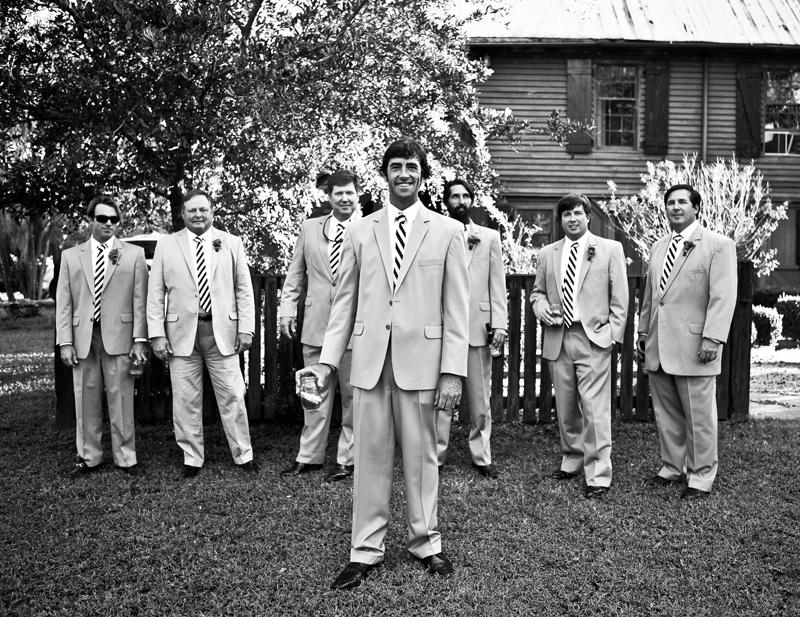 HEY, GOOD LOOKIN’:  John and his groomsmen wore khaki-colored suits from Berlin’s for Men. Of the ties Ashley says, “When I saw Harper’s Proud Mary black and white-striped ties, I knew it was a sign.”