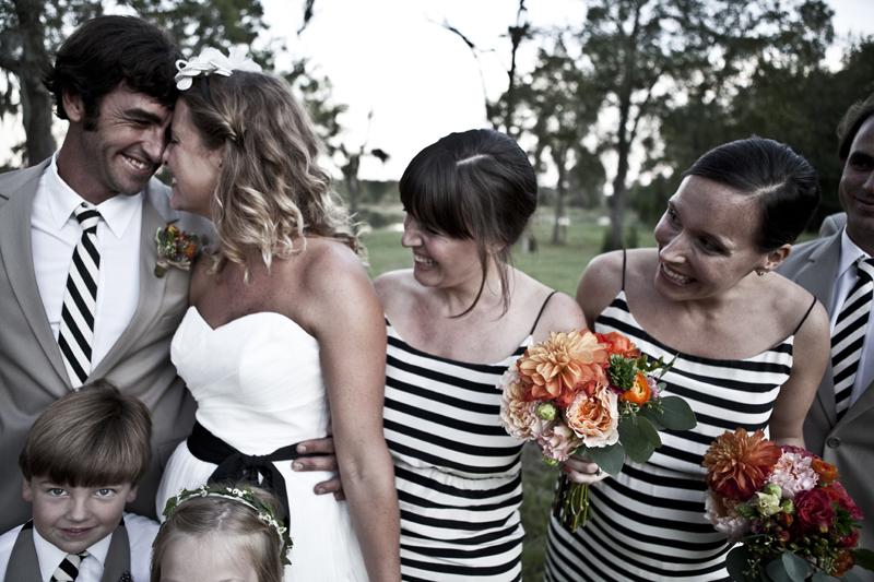 SUIT YOUR FANCY: Ashley says that as a designer, she is inspired by bold graphics, so it’s fitting that she chose these back and white striped bridesmaids dresses.