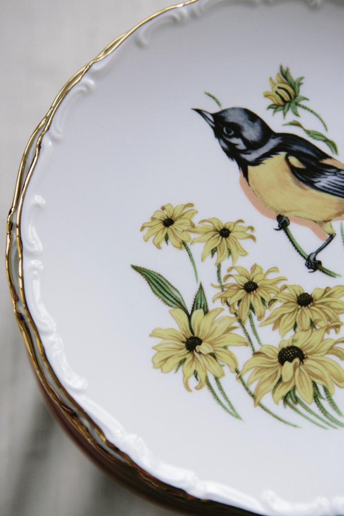 DISH DUTY: Sarah scoured auctions and flea markets for vintage china plates to display the cakes and serve dinner.