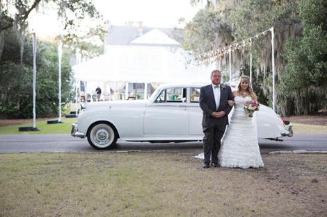 SWEET RIDE: Sarah and her father stepped out of Limos for Less&#039; 1957 Bentley and then walked down the aisle.