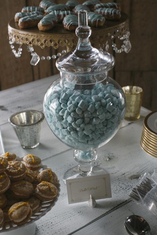 HUE KNEW: Instead of spreading the wedding’s blue palette throughout the ceremony and reception, Abby maximized its impact by concentrating it to the dessert table.