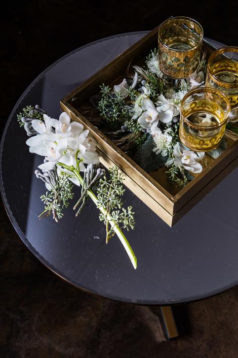 TRAY BIEN: Give some life to a serving tray when you deconstruct boutonnieres or bouquets post-ceremony and tuck them under lucite.