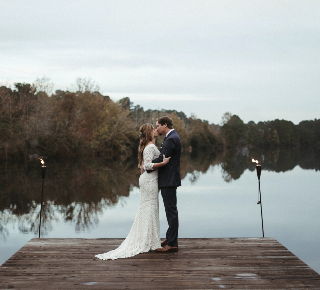 Foregoing the traditional Charleston beach or plantation wedding venue, Sarah Knowles and Ben Creasy sought a more rustic retreat, where they could accommodate family and friends for a whole week before, during, and after the wedding. The Lake House at Bulow County Park on John’s Island allowed them opportunities for hiking, kayaking, fishing, games, and relaxation with their nearest and dearest.