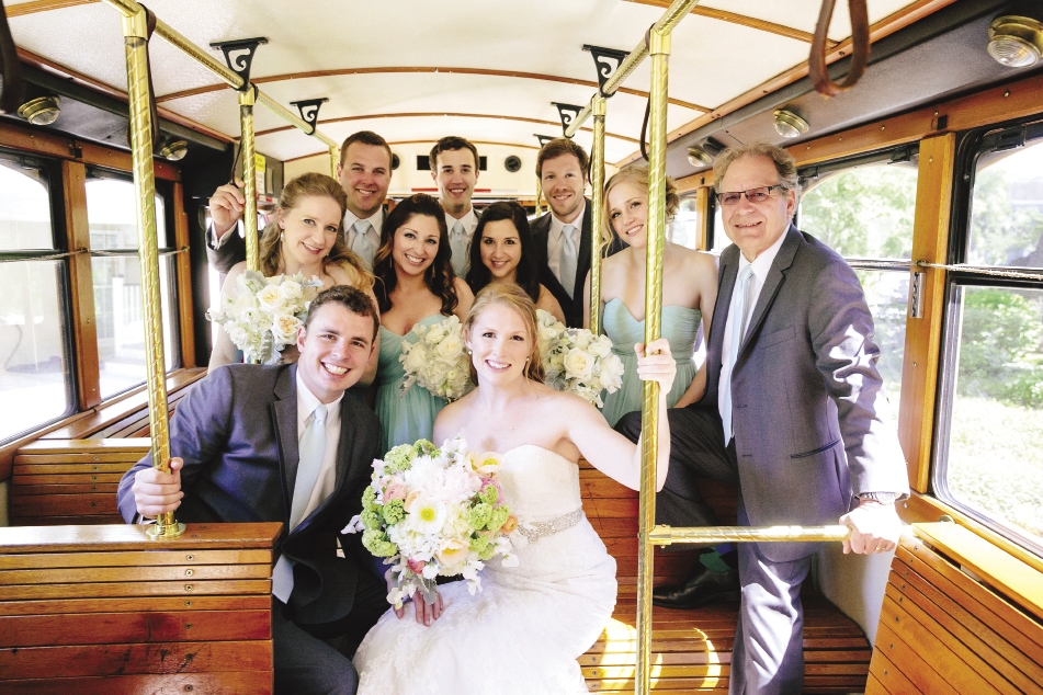 GANG’S ALL HERE: Following a pre-ceremony “first look” at the Cottages on Charleston Harbor (see Tyler’s priceless reaction on page 54), the couple and their wedding party hopped aboard Lowcountry Loop Trolley to head to the ceremony. “Riding over with Jenn was one of the best parts of the entire day,” says Tyler.