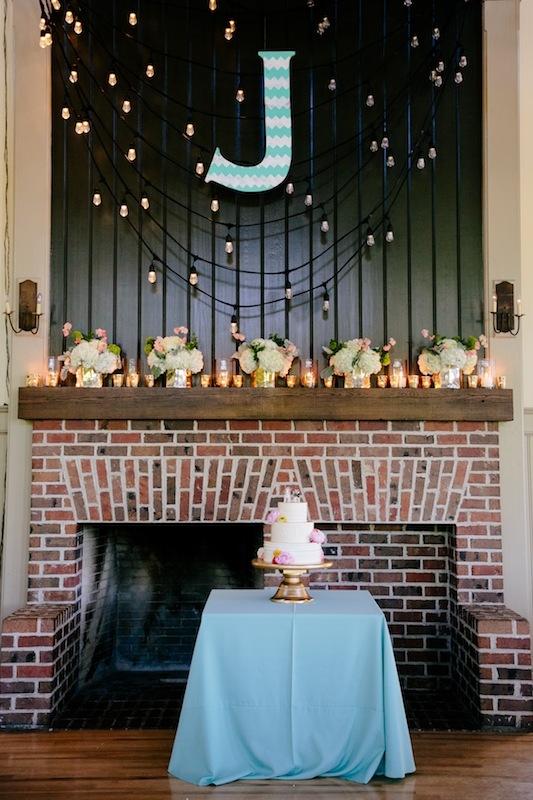 Wedding design by Southern Protocol. Lighting by Innovative Event Services. Florals by Branch Design Studio. Cake by The Cake Stand. Image by Dana Cubbage Weddings at Creek Club at I’On.