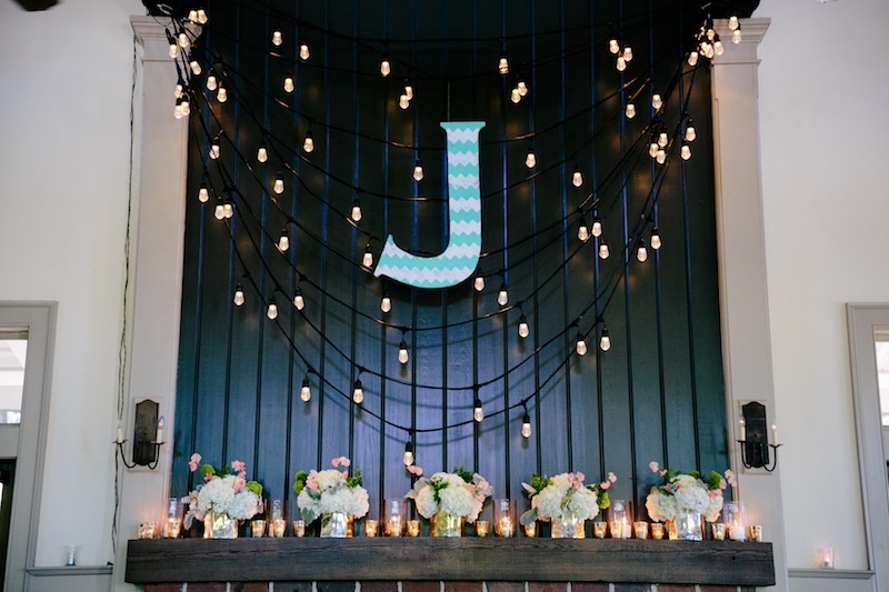 Wedding design by Southern Protocol. Lighting by Innovative Event Services. Florals by Branch Design Studio. Image by Dana Cubbage Weddings at Creek Club at I&#039;On.