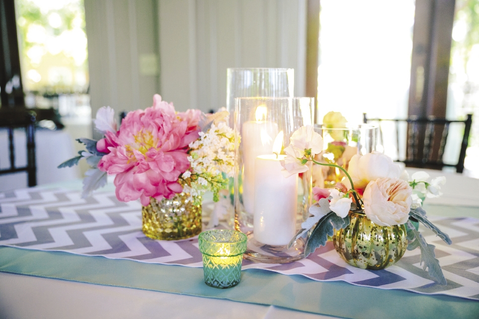 SMART TOUCH: Gray chevron runners from EventWorks added a crisp pattern to reception tablescapes.