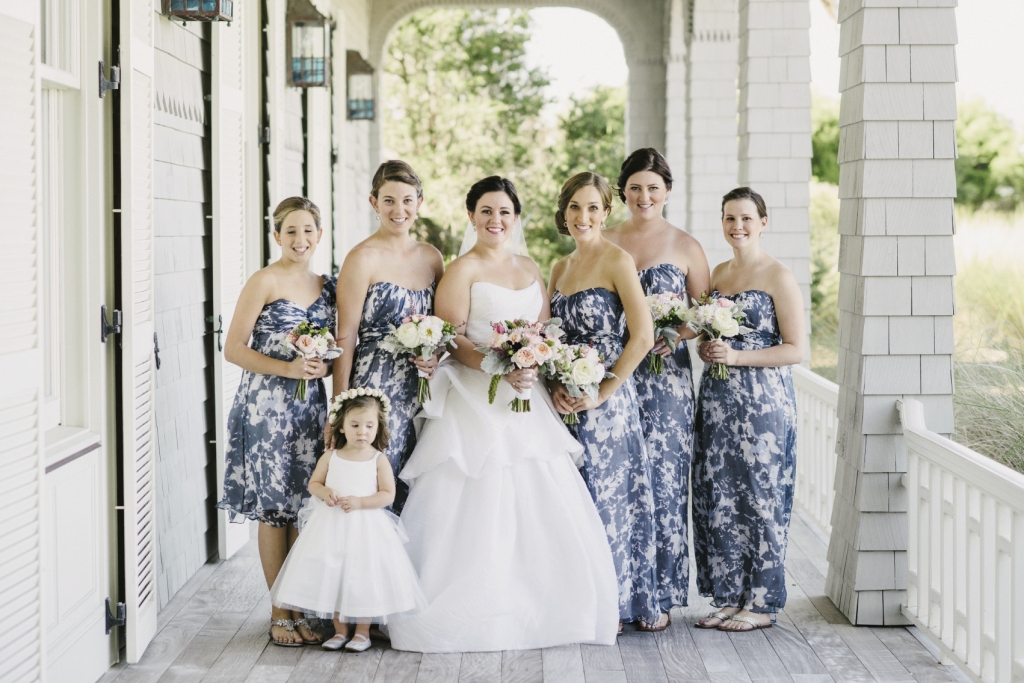 Bride&#039;s gown by Monique Lhuillier (available locally at Maddison Row). Bridesmaid dresses by Amsale (available locally through Bella Bridesmaids). Flower girl&#039;s dress by US Angels. Florals by A Charleston Bride. Photograph by Sean Money &amp; Elizabeth Fay.