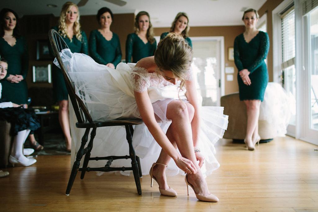 Bride&#039;s gown by Tara Keely. Bridesmaids&#039; dresses by Adrianna Papell (available locally at Bella Bridesmaids). Hair by Krystal Yangco. Shoes by J. Crew. Image by Julia Wade Photography.