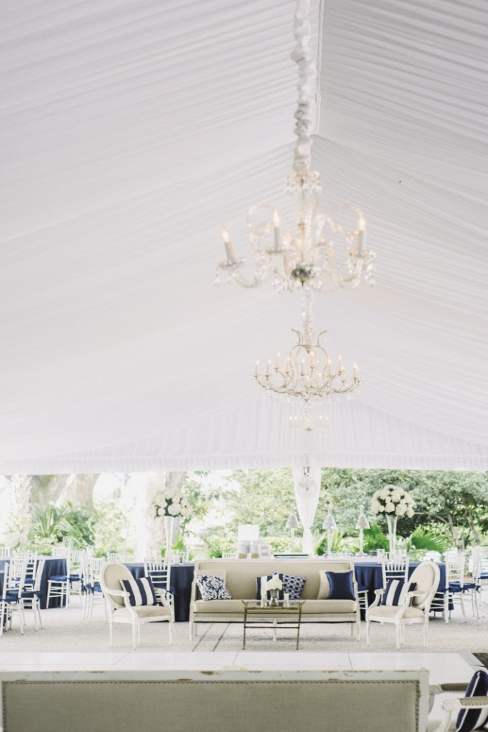 CONVERSATION STATION: “We tucked seating all throughout the setting for a bit of discovery on the part of the guests,” says Lindsey of the lounge  areas that dotted the reception tent and overflowed onto the grounds. “It was formal but  spread across the open landscape for ease and flow.”