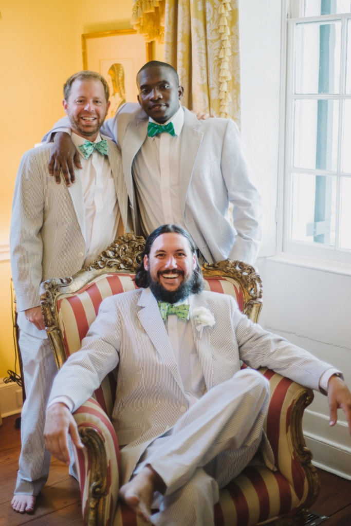 Groom and groomsmen’s suits by Hardwicks. Bow ties by Southern Proper and Bird Dog Bay. Photograph by Sean Money + Elizabeth Fay at Lowndes Grove Plantation.